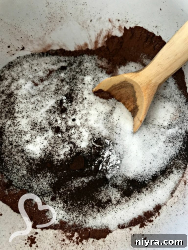 Mixing dry ingredients for brownies in a bowl