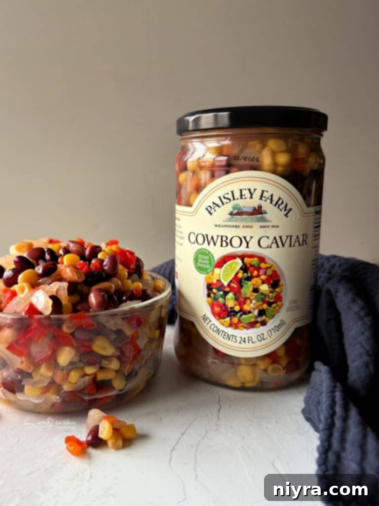 Paisley Farm Texas Caviar jar in a rustic setting