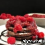 Side view of Chocolate Pancakes with Raspberry Sauce