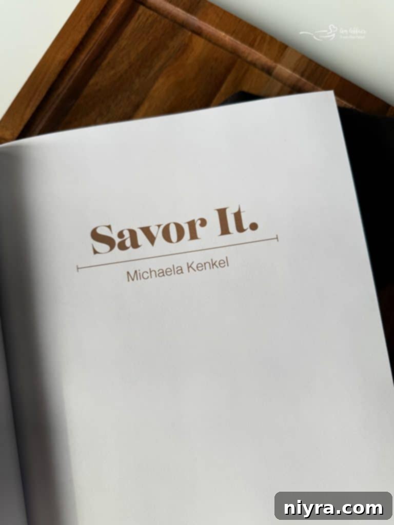 Author Michaela Kenkel with her Savor It cookbook