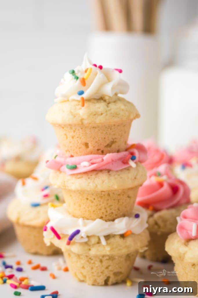 Frosted Sugar Cookie Delights 11 A tray of freshly baked sugar cookie cups cooling.