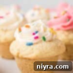 Frosted Sugar Cookie Delights 14 Close up of a white frosted Sugar Cookie cup.