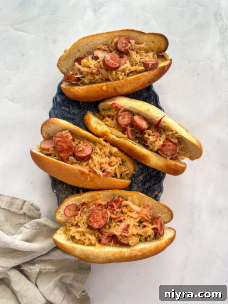 Collage image for pinning Kielbasa and Sauerkraut Hoagies