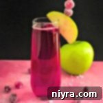 side view of CranApple Fizz Cocktail