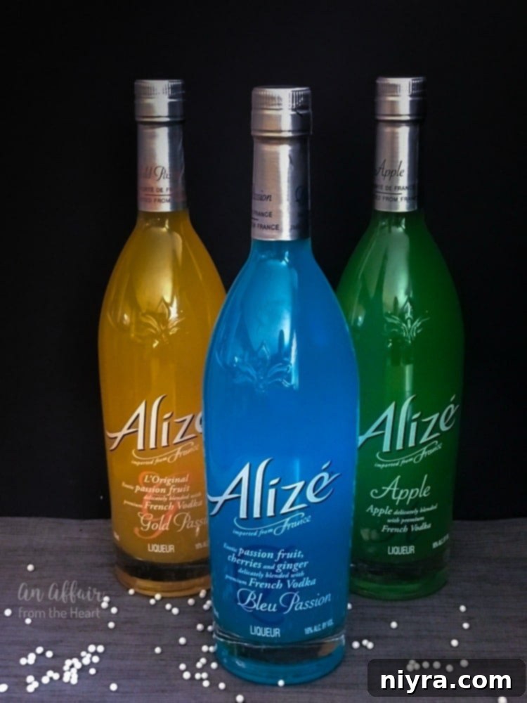 A selection of Alizé liqueur bottles, showcasing their vibrant colors and diverse flavors.