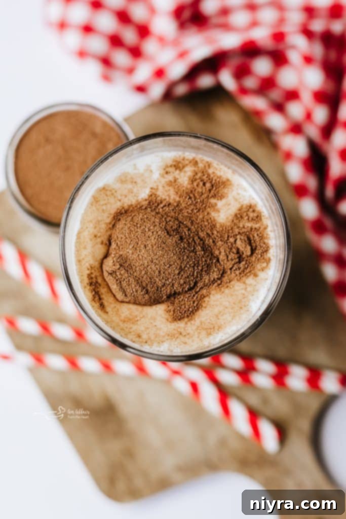 Homemade Copycat Nesquik Recipe 8 A jar of homemade Nesquik chocolate powder, neatly labeled and ready for use in the pantry.