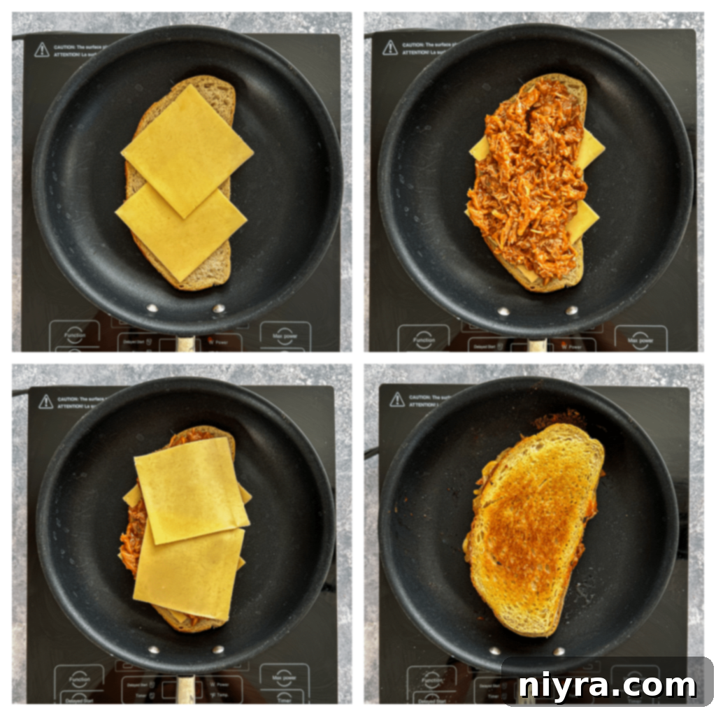 Assembling a Pulled Pork Grilled Cheese sandwich with cheese, pulled pork, and more cheese layers.