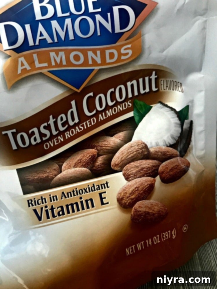 Close-up of toasted coconut almonds, ready to be incorporated into the rum ball mixture.