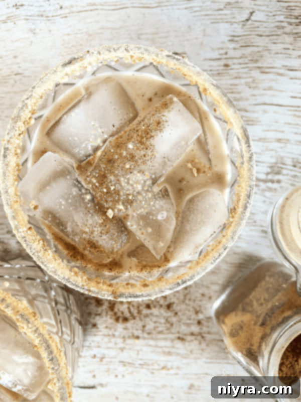 Pink Velvet Dream 15 Overhead, close up of pumpkin white russian cocktail with ice in it.