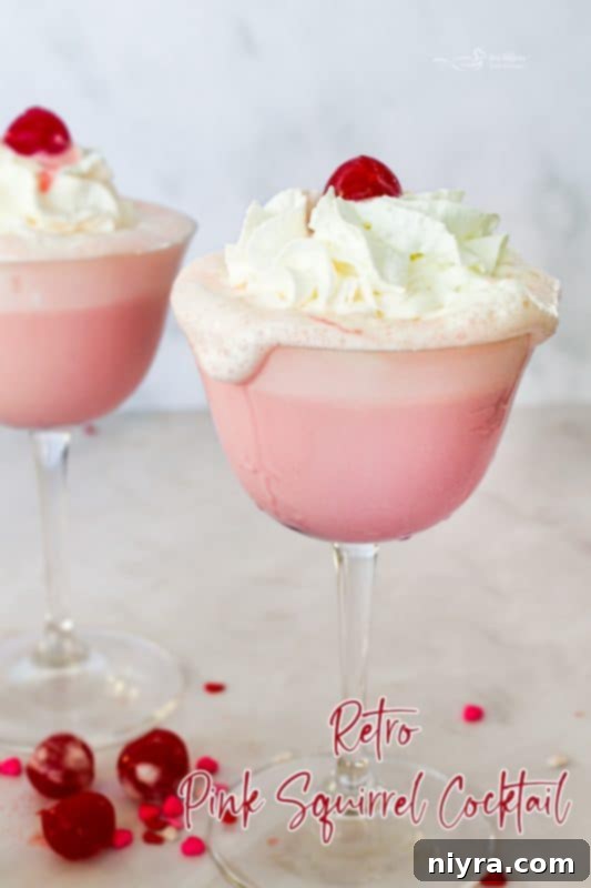 Pink Velvet Dream 16 Pink Squirrel cocktail in an elegant glass, ready to be enjoyed.