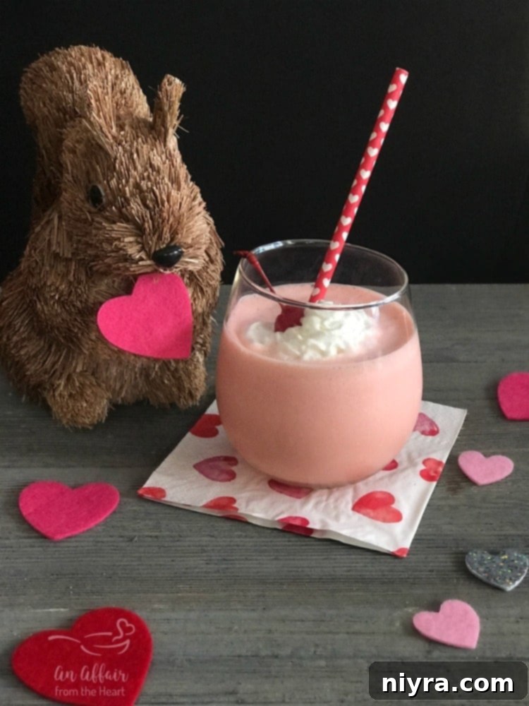 Pink Velvet Dream 19 Pink Squirrel cocktail in a glass, top view.