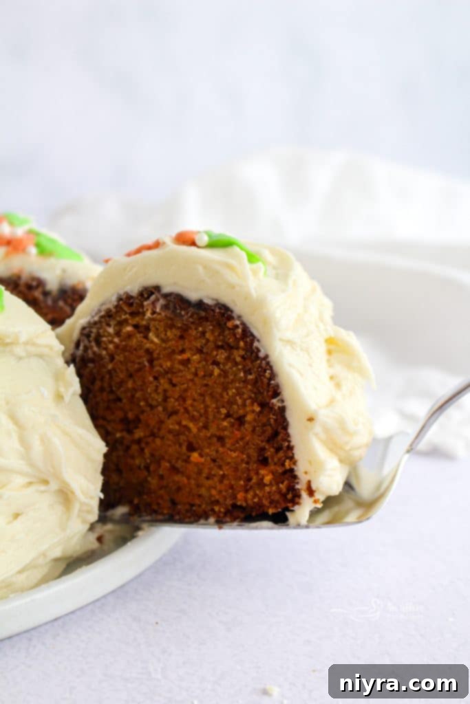 Carrot Bundt Cake with Cream Cheese Frosting decorated with orange zest
