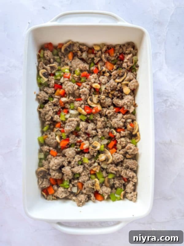 Golden Sausage Crescent Roll Bake 12 Topping crescent rolls with sausage mixture