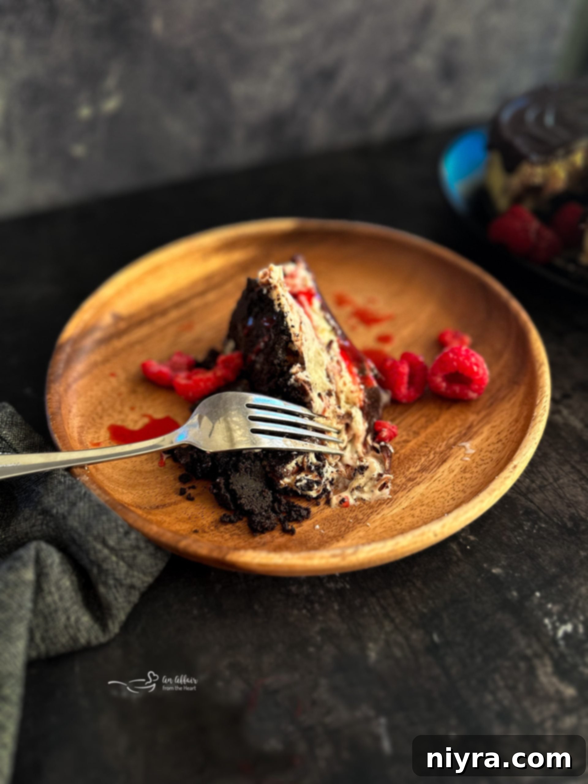 Decadent White Chocolate Raspberry Truffle Cheesecake 1 featured 241