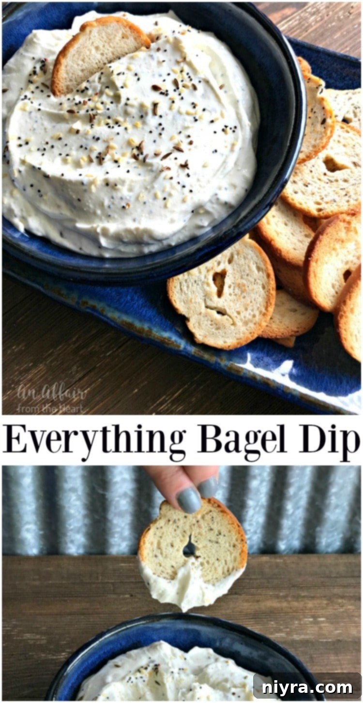 Close-up of Everything Bagel Dip in a bowl with a hand dipping a bagel chip.