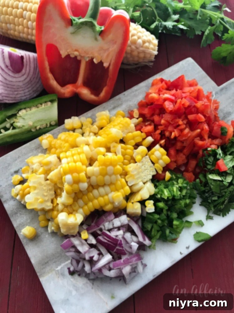 Zesty Mexican Four Bean Salad 6 Ingredients for Mexican Four Bean Salad laid out on a cutting board