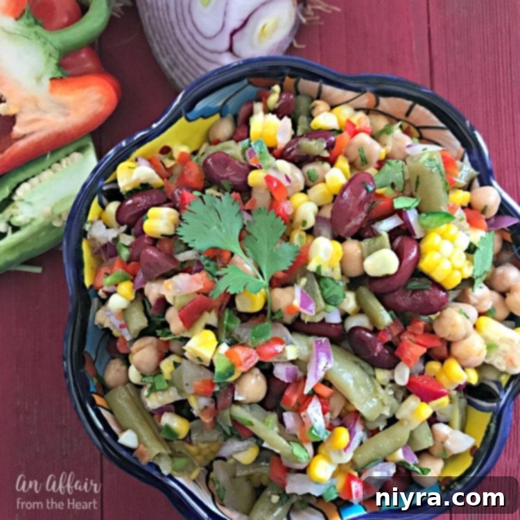 Zesty Mexican Four Bean Salad 8 Square image of Mexican Four Bean Salad in a bowl