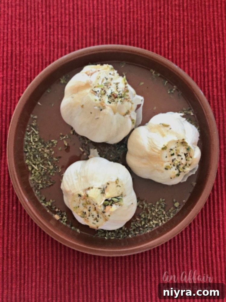 Whole garlic bulbs, ready for roasting, hinting at the delicious transformation to come