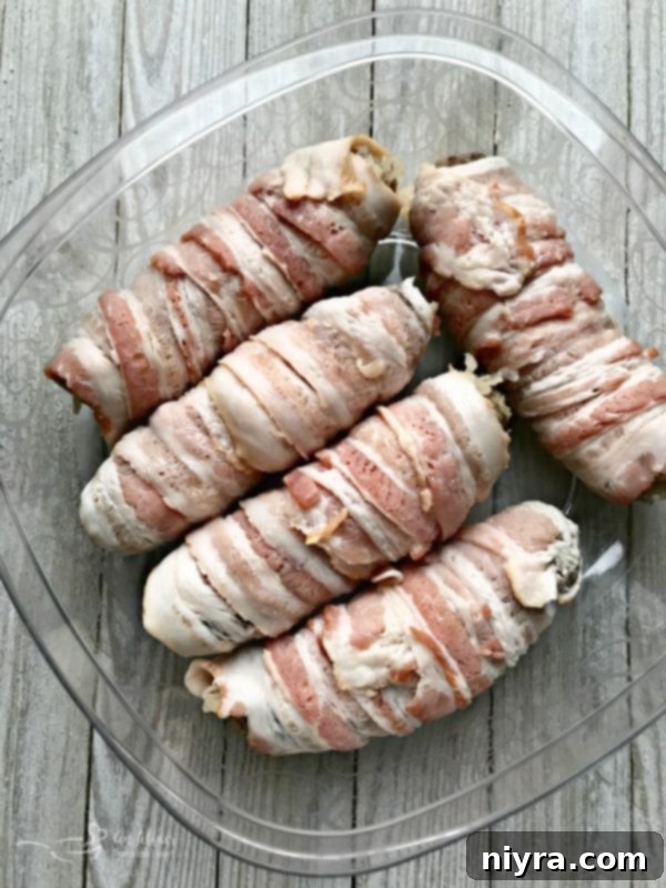 Kraut Stuffed Bacon Wrapped Brats for tailgate party