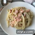 Creamy Smoked Salmon Pasta 8 Smoked Salmon Pasta on a white plate