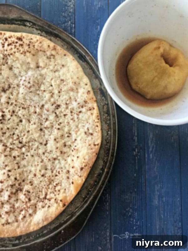 Refrigerated pie crust sprinkled with cinnamon and sugar