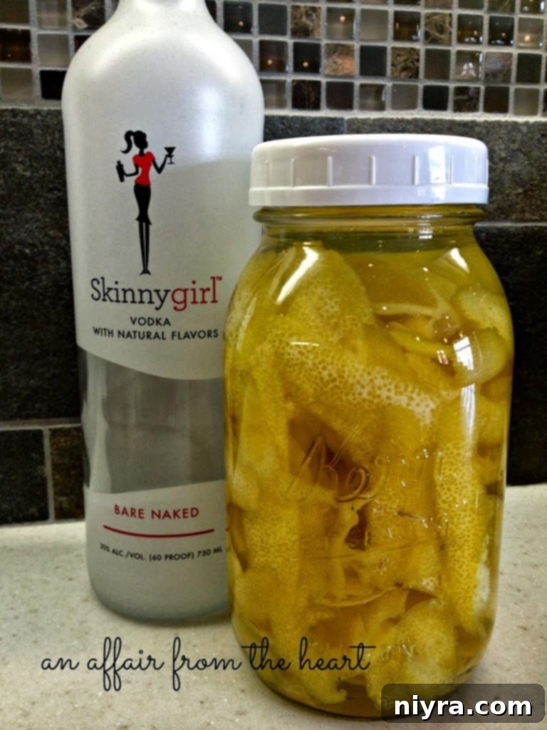 A vibrant glass bottle filled with homemade Limoncello, garnished with fresh lemon slices, symbolizing refreshing sweetness.