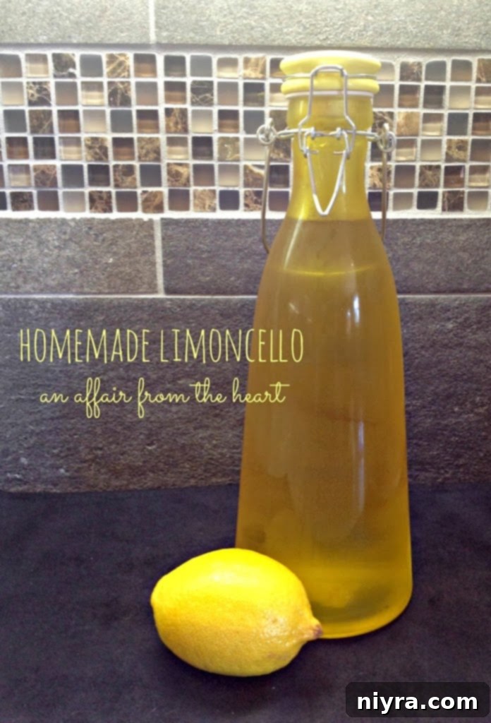 A close-up of a glass filled with homemade Limoncello, showcasing its bright yellow color and smooth texture, ready to be enjoyed.