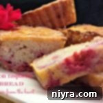 Close up of Lemon Raspberry Bread Sliced and text "lemon raspberry bread"