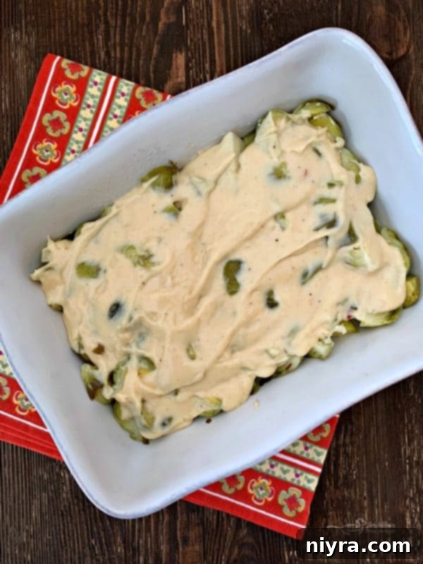 Preparing the cheese sauce for Brussels Sprouts Gratin
