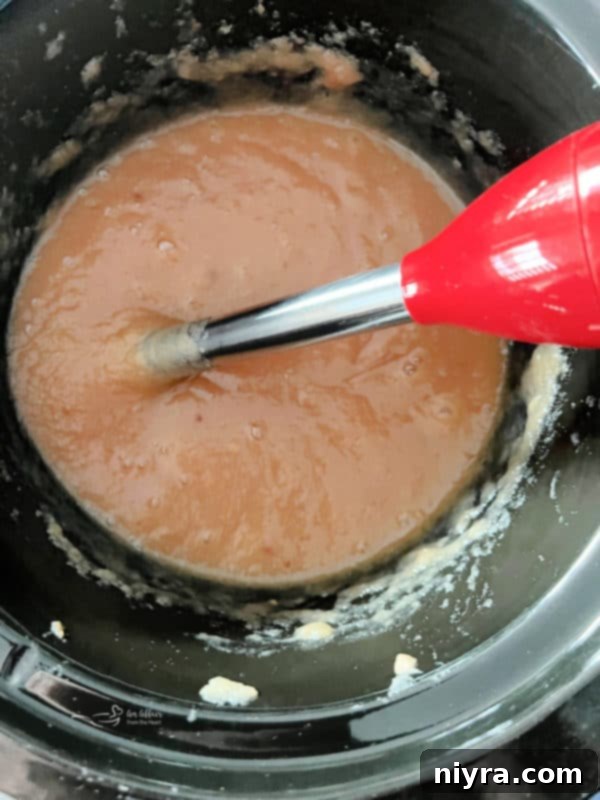 stick blender to blend crock pot applesauce