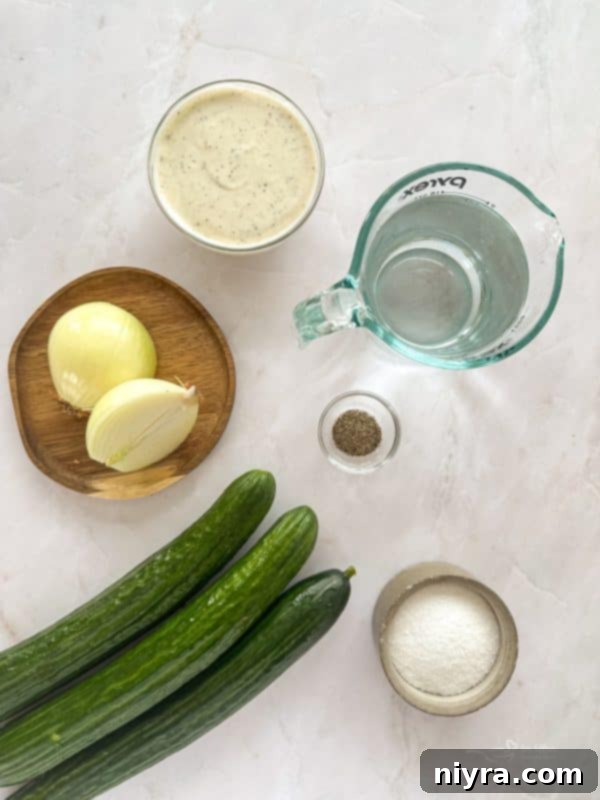 Crisp Cucumber Ranch Salad 5 Preparing cucumbers for a creamy ranch salad.