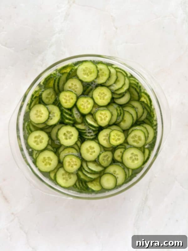 Crisp Cucumber Ranch Salad 7 Step-by-step photo of preparing cucumber ranch salad.