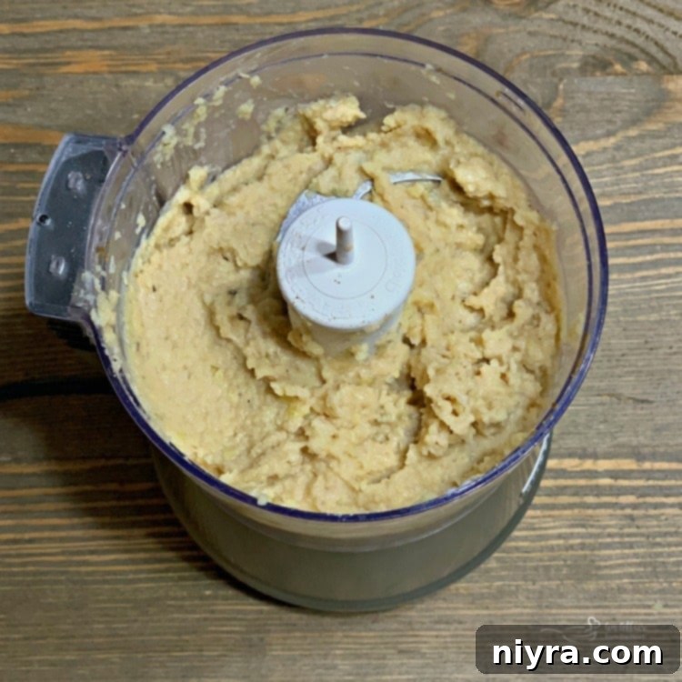 Making Cauliflower Hummus in a food processor