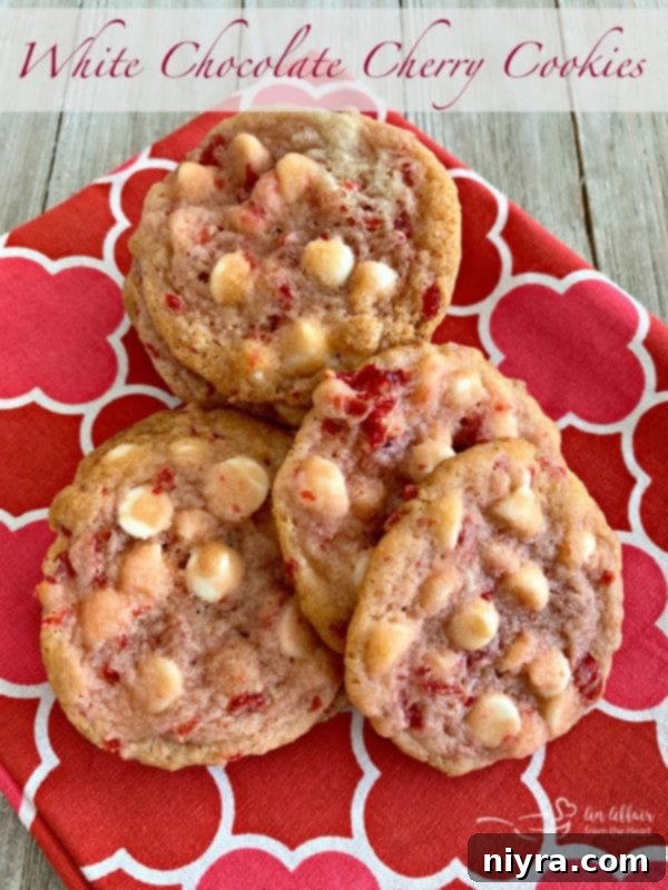 Sweet Cherry White Chocolate Delights 15 White Chocolate Cherry Cookies artfully arranged on a large platter