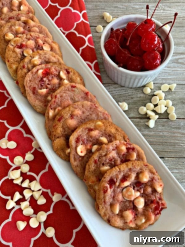 Sweet Cherry White Chocolate Delights 17 White Chocolate Cherry Cookies arranged beautifully with fresh Maraschino cherries