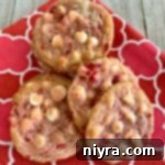 Sweet Cherry White Chocolate Delights 20 White Chocolate Cherry Cookies on a red and white cloth napkin