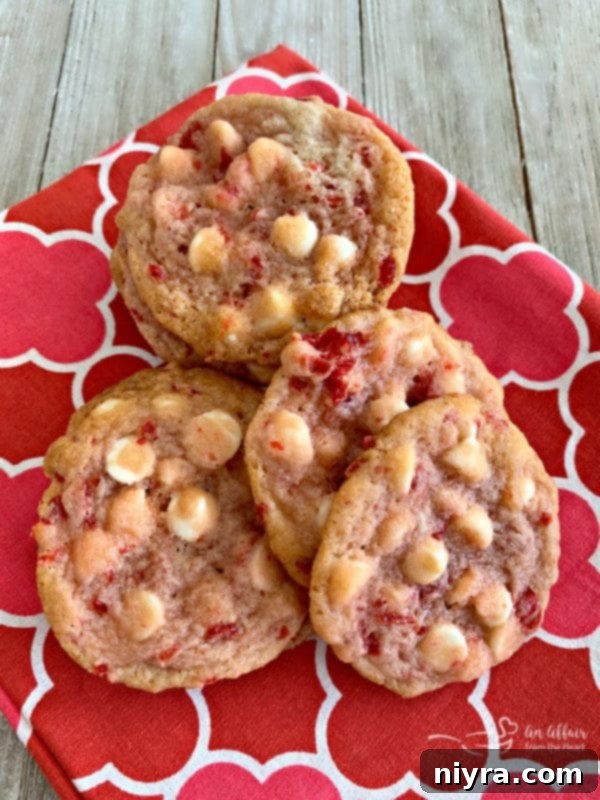 Sweet Cherry White Chocolate Delights 22 Closeup of three White Chocolate Cherry Cookies, showing their inviting texture