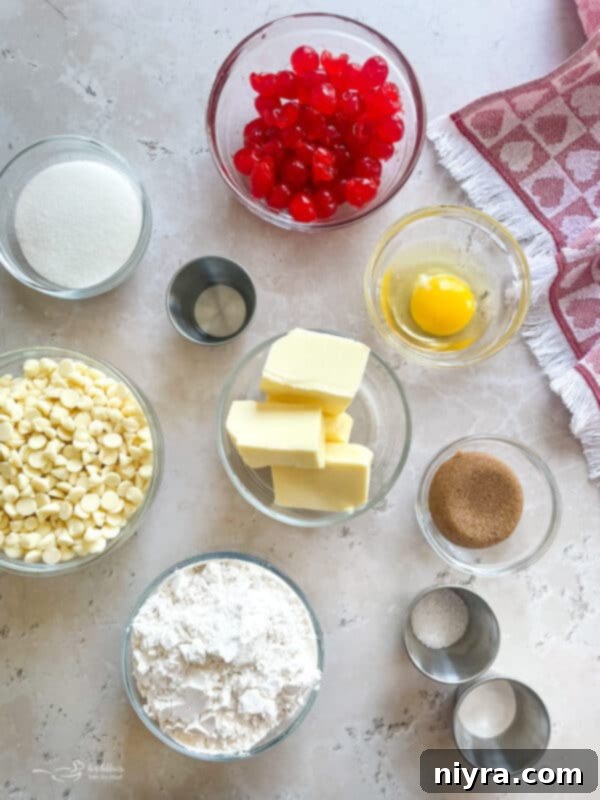 Sweet Cherry White Chocolate Delights 7 Freshly baked White Chocolate Cherry Cookies, showcasing their vibrant pink dough and white chocolate chunks