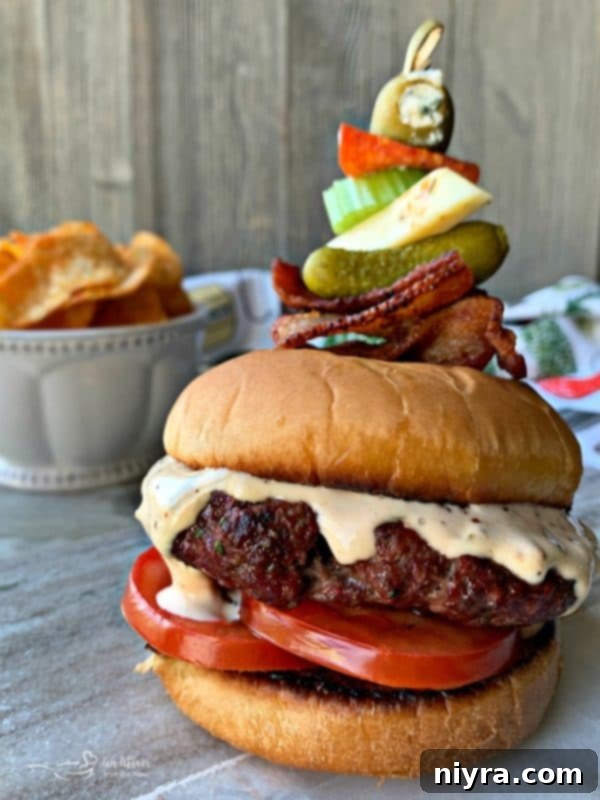 Bloody Mary Burger with garnish on grey platter