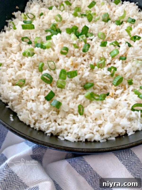 A close-up of golden brown, crispy garlic pieces, a key ingredient for fried rice
