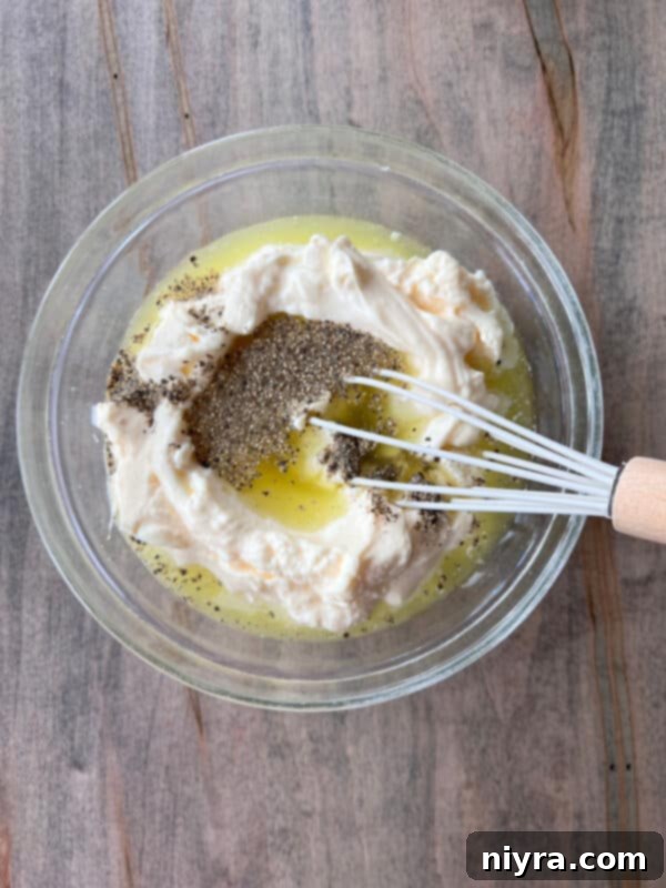 Hearty Spam Pasta Salad 5 Cooked elbow macaroni pasta in a large mixing bowl, ready for assembly.