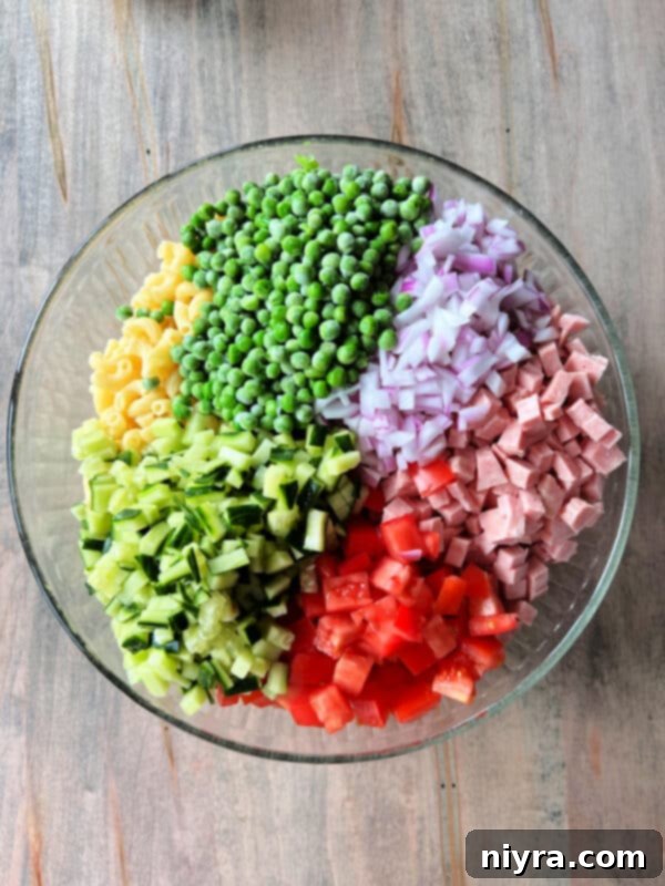 Hearty Spam Pasta Salad 7 The bowl of prepared dressing is set aside on the counter.