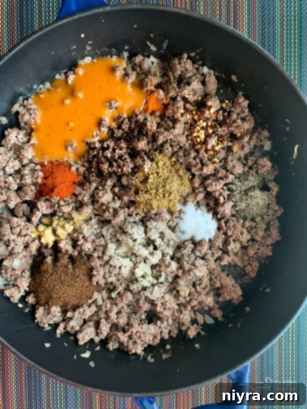 Ground beef being prepared for Taco Salad with Dorothy Lynch Taco Sauce.