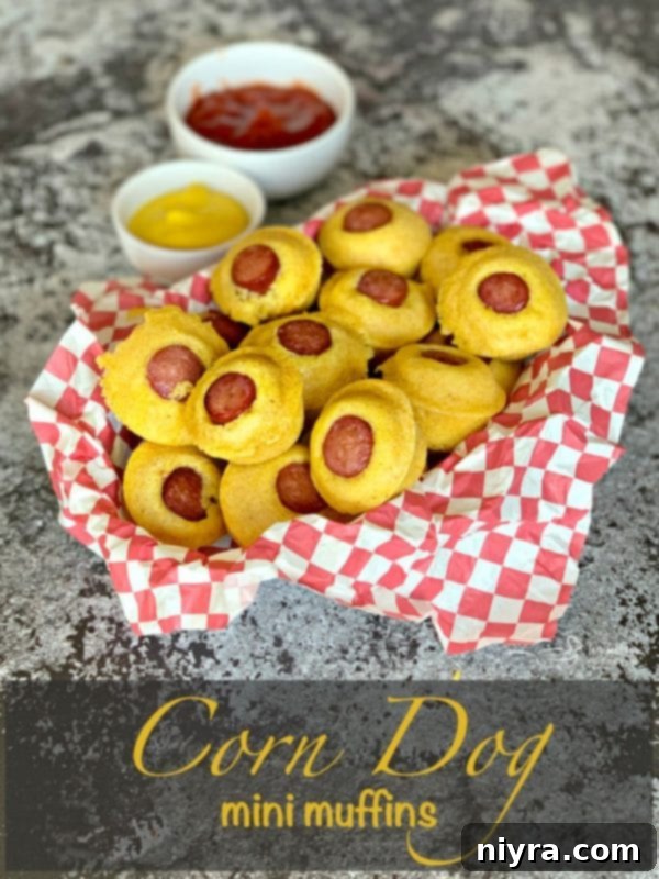 A close-up hero shot of Corn Dog Mini Muffins artfully arranged on a serving board