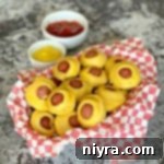 Close up of Corn Dog Mini Muffins in a basket