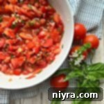 Overhead of Tomato Bruschetta in a white bowl
