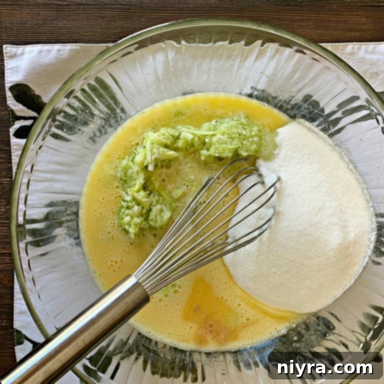 Mixing wet ingredients for Grandma's Zucchini Bread
