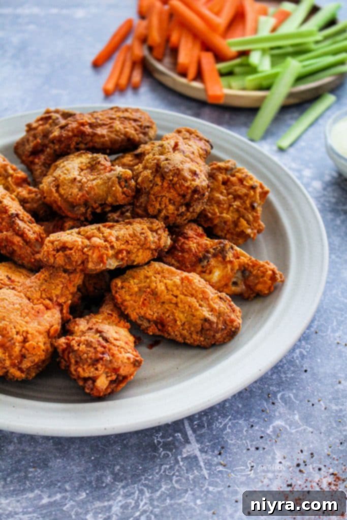 Crispy Hooters Style Air Fryer Wings 4 Platter of Air Fryer Copycat Hooters Wings ready to be served
