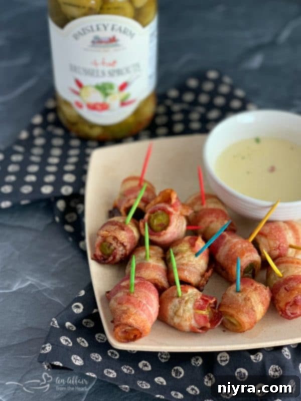 Bacon Wrapped Hot Brussels Sprouts Paisley farm with cheese sauce