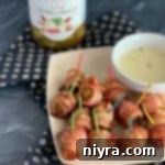 Bacon Wrapped Hot Brussels Sprouts Paisley farm with cheese sauce